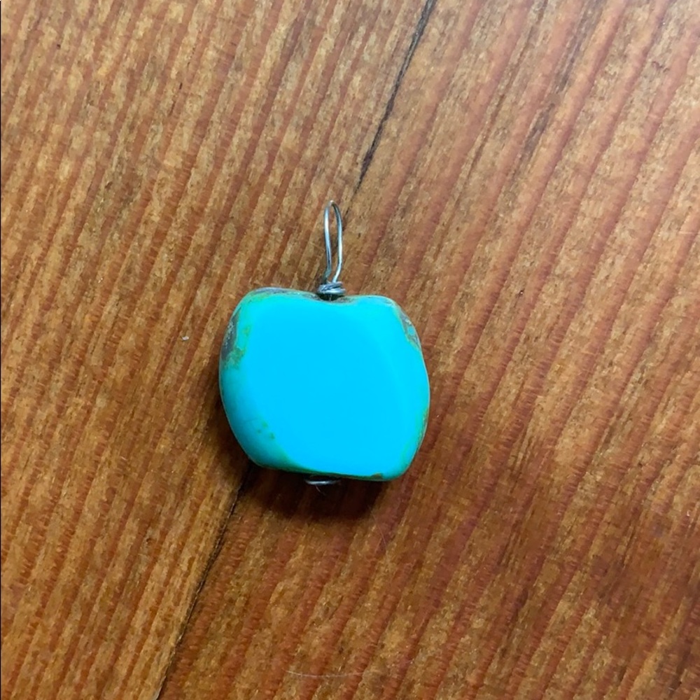 Handmade turquoise/green stone pendant.